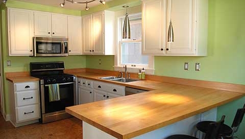 Green and wood matching styles kitchen design