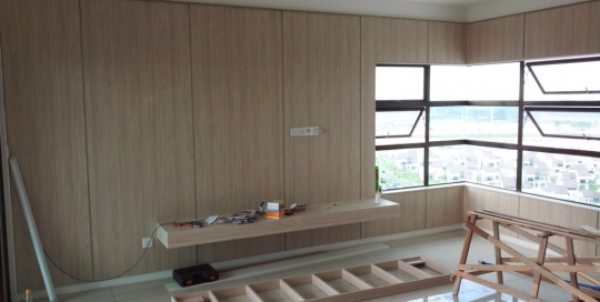 Living room wood finish formica wall panels with TV console