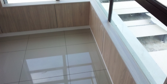 Formica laminated wood feature wall and formica laminated wood window stool